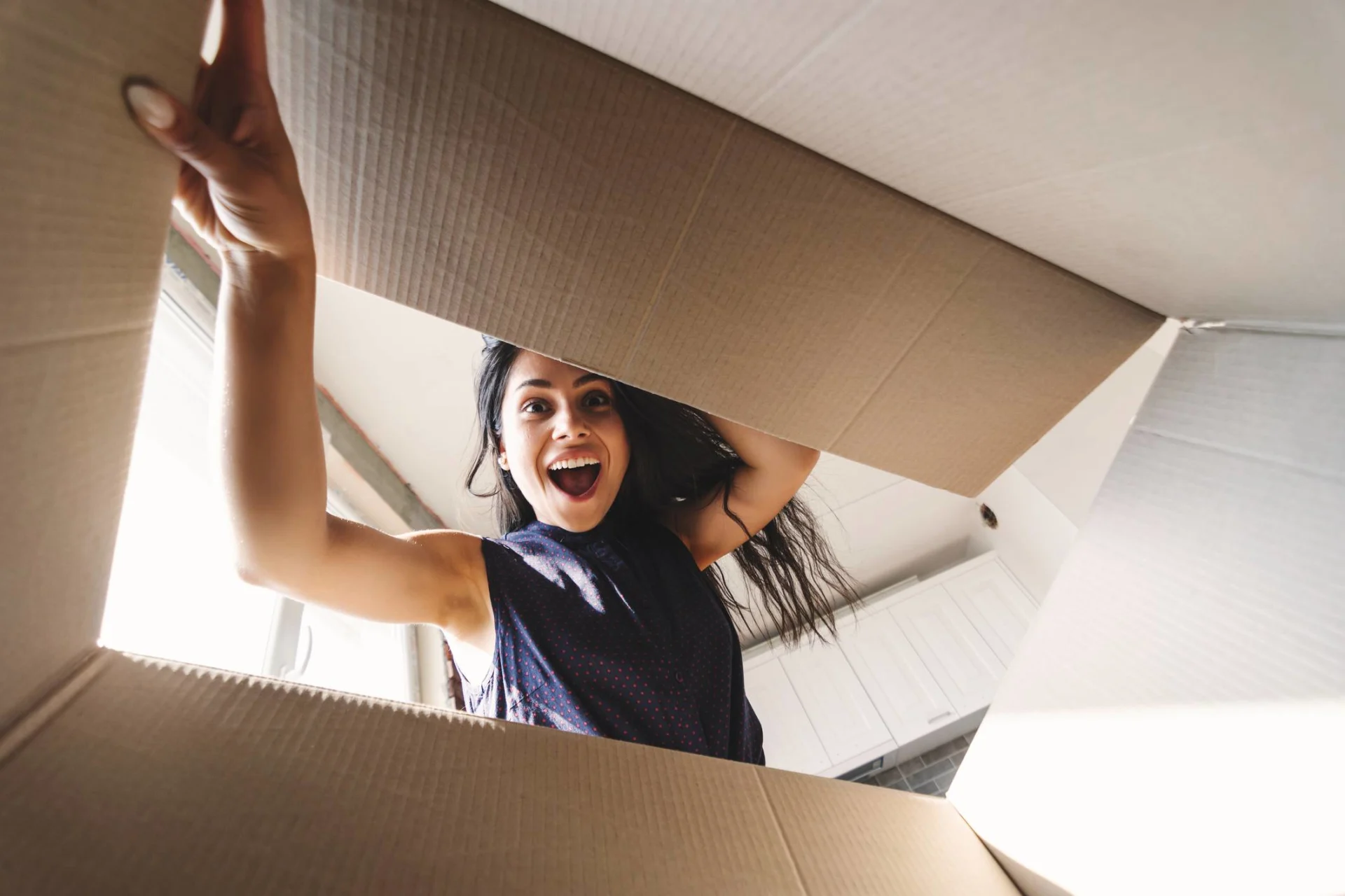 Girl looking into parcel